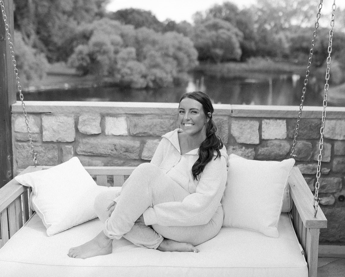 emily sitting on swing