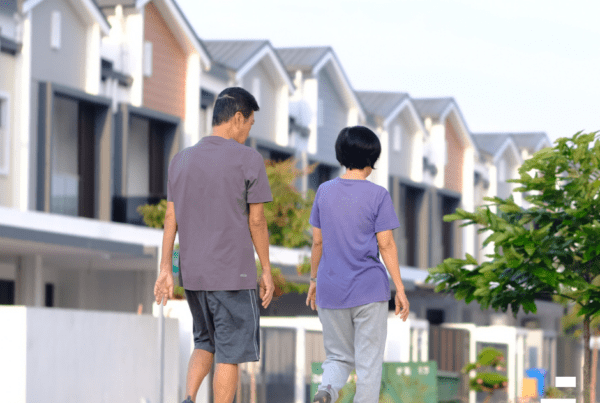 kids walking in front of houses